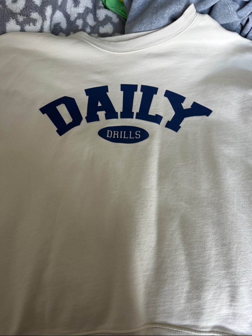 Daily Drills Cream Crewneck Sweatshirt with Blue Logo